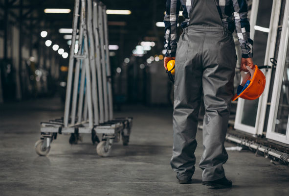 Industriarbeider som arbeider. Foto.